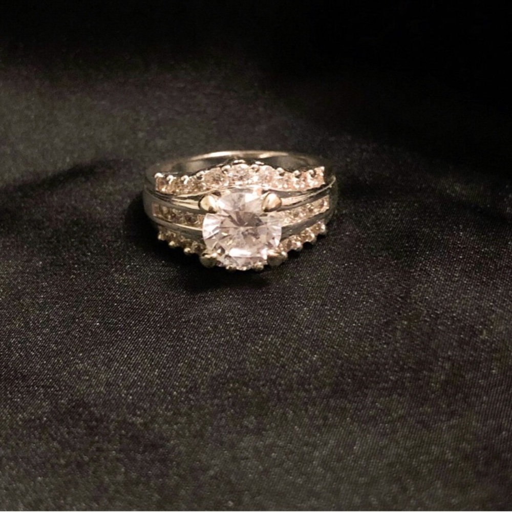 Lightly used silver tone faux stone ring